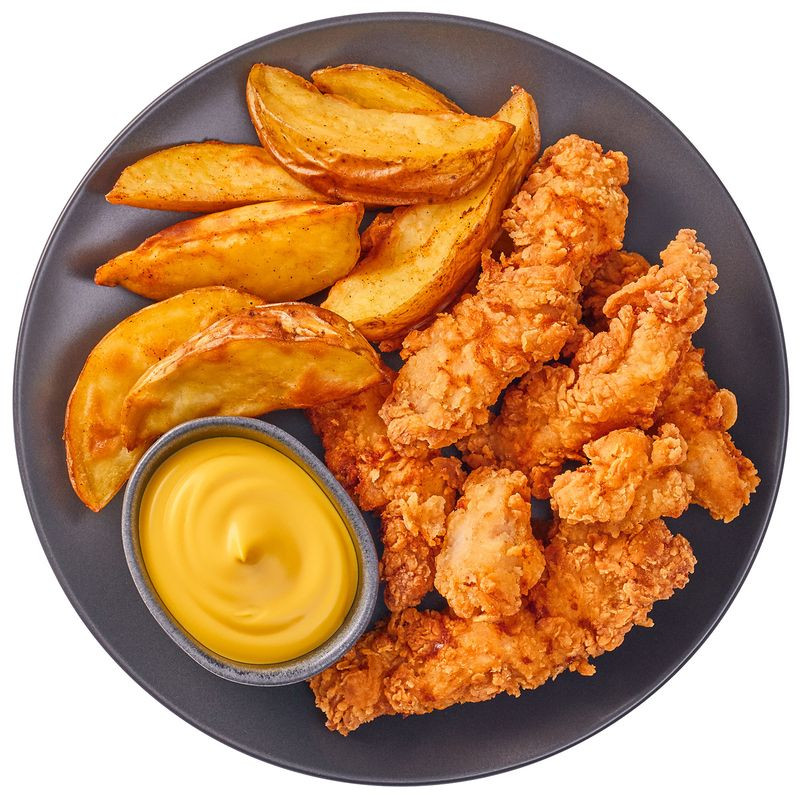 Изображение товара Стрипсы из куриного филе с картофелем по-деревенски и сырным соусом Перекрёсток Select 265г